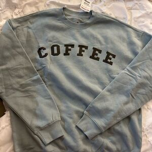 T.J.Maxx Blue Sweatshirt with Coffee Lettering
